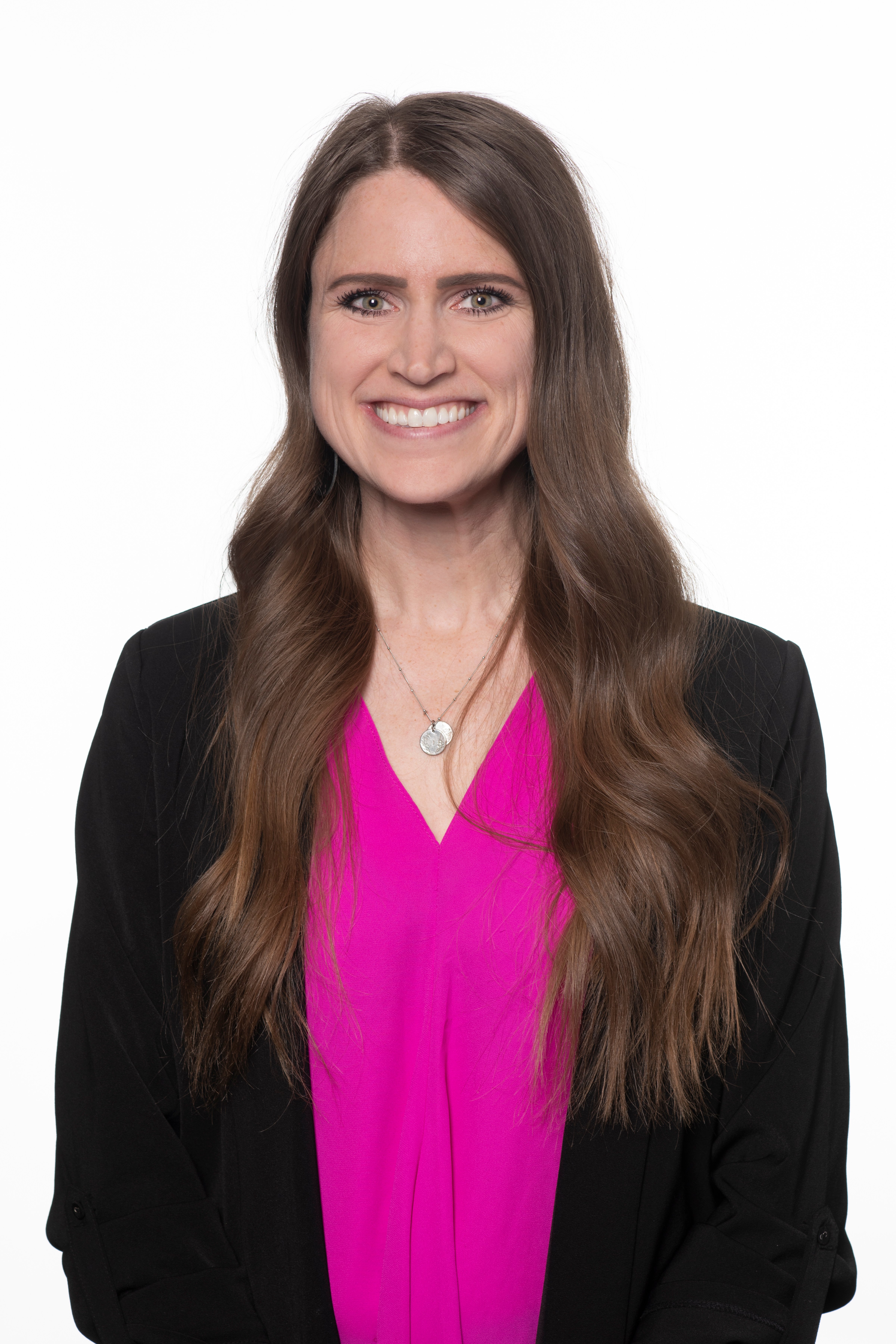 Headshot of Michaela Norton smiling.