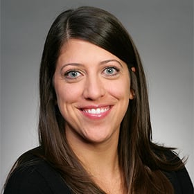 Headshot of Amy Ricketts smiling.