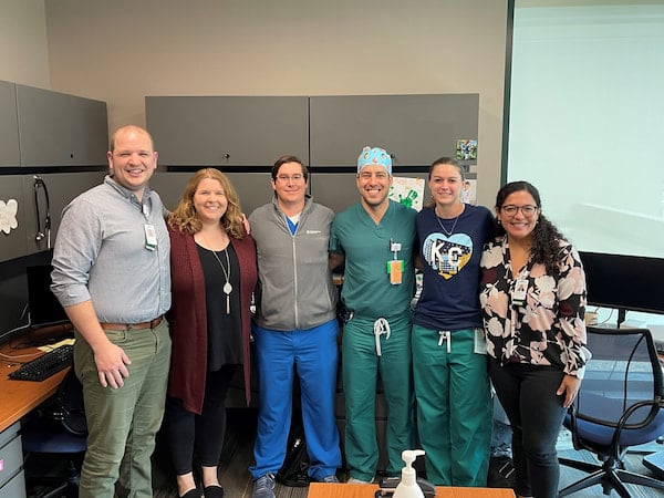 Six Children's Mercy gastroenterology fellows pose together in an office.