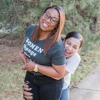 Lexi Wright with daughter in nature 