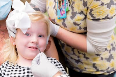 Close up of female child during a nasal scope procedure 