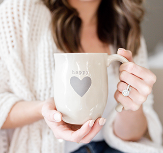 Woman holding coffee mug