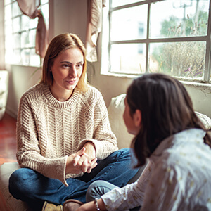 mom talking with daughter