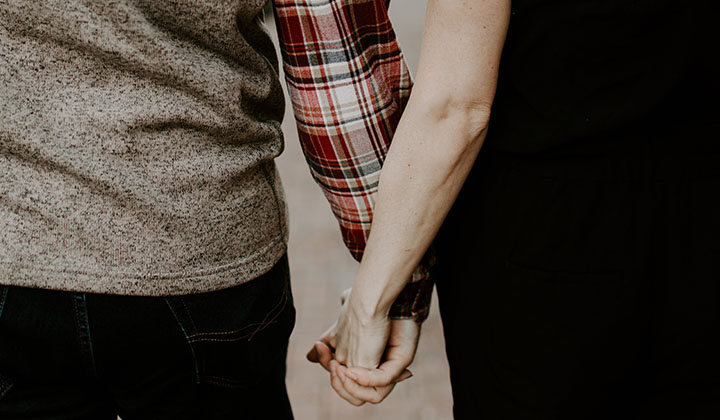 parents holding hands